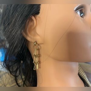 Gold tone pierced dangling earrings jewelry